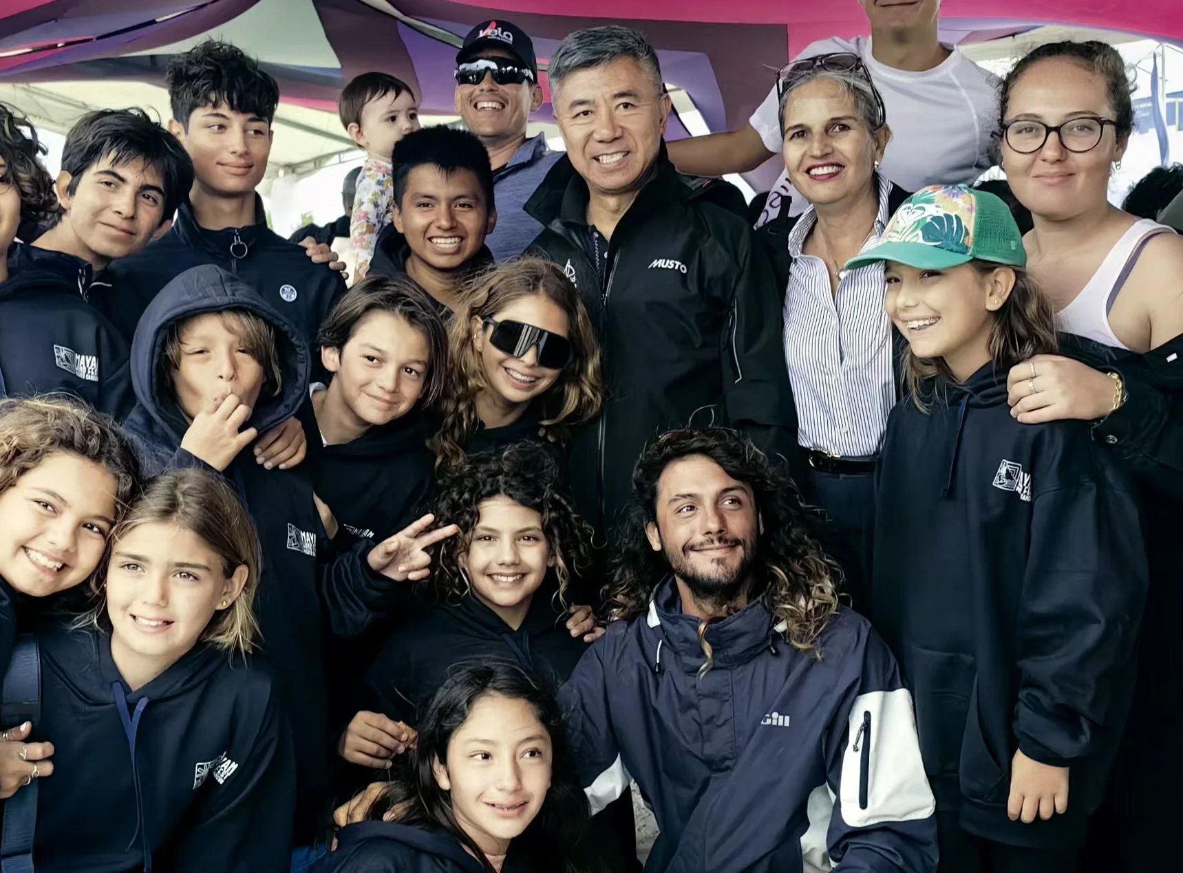 Quanhai Li with young sailors