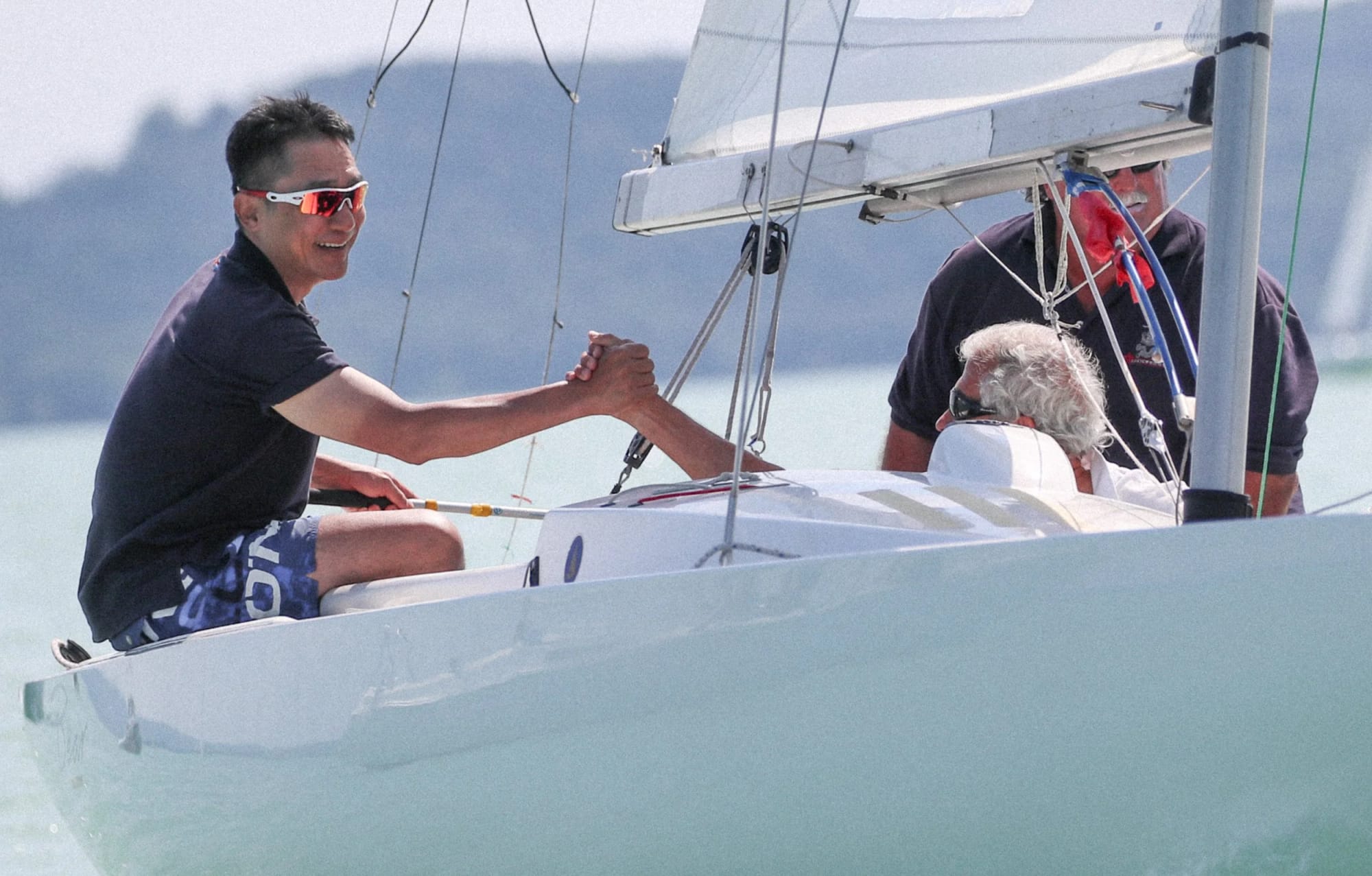 Tony Leung racing a Dragon.